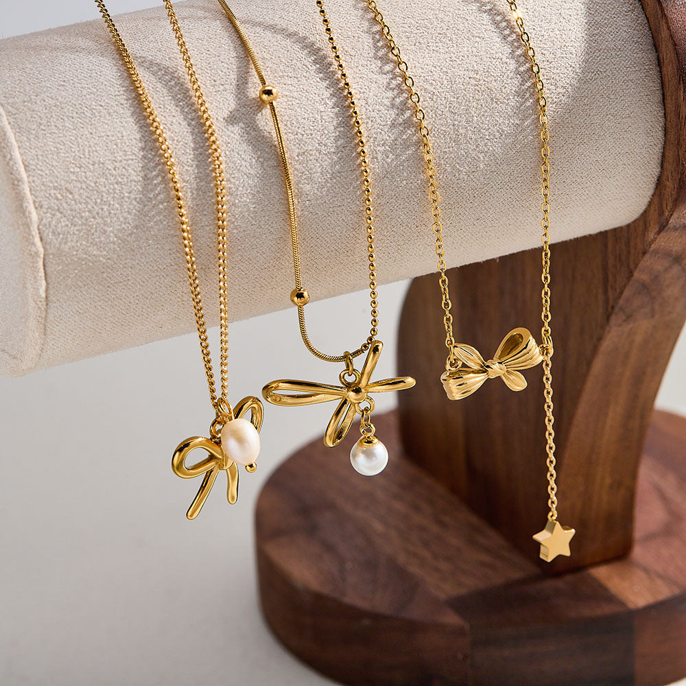 Bowknot Stainless Steel Necklace with Zircon Pearl Pendant